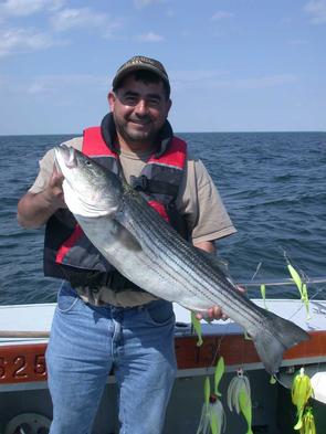 Eddie and his very healthy striper!