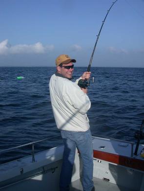 John ties into his first big striper of the year!