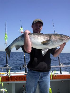 Arron and his biggest lifetime fish at 47 inches 38 pounds