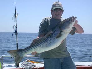 Eric and this 42 inch trophy striper