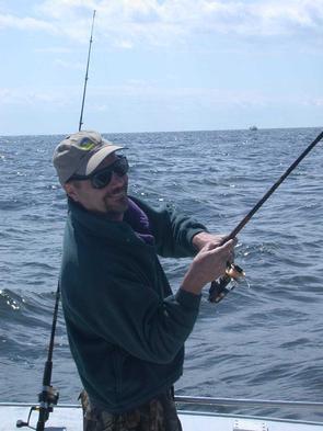 Tim hooks up on the first light tackle chumming trip of the season
