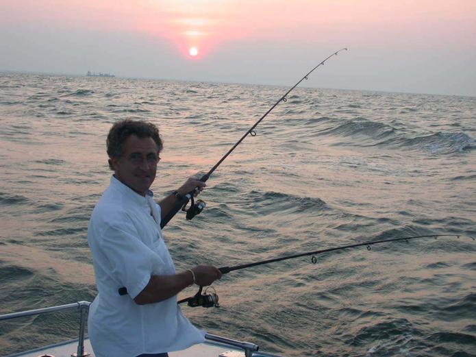 Rough seas did not stop Mario from fishing two handed for award winning croakers
