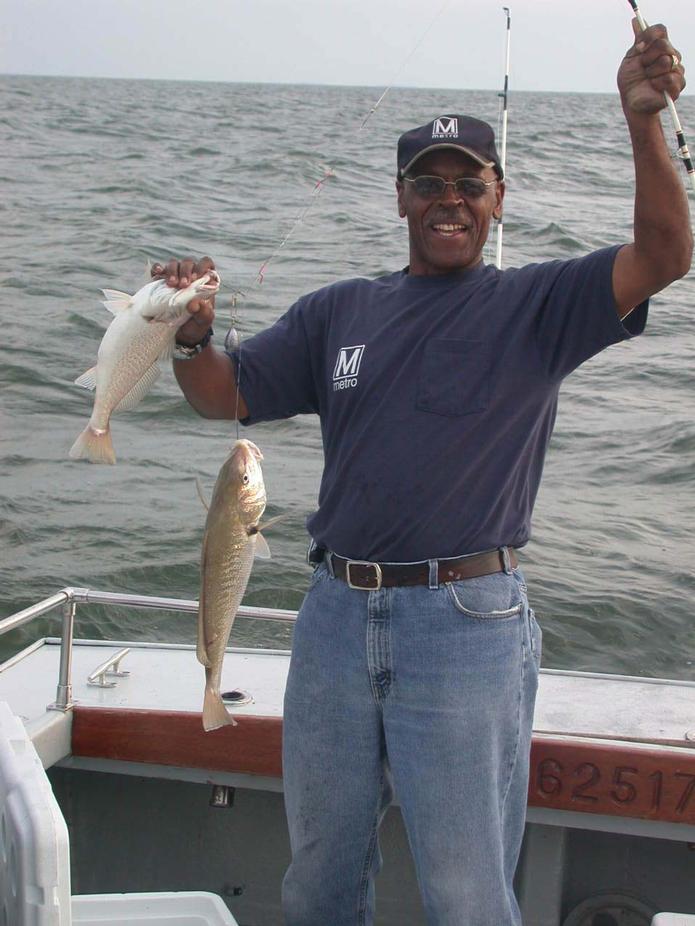 AC Cowan with a trophy double header croaker