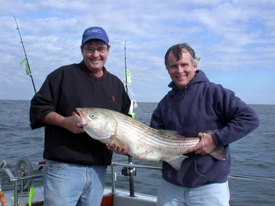 Steve Cross and Hayward Bacon hold up this great looking fish