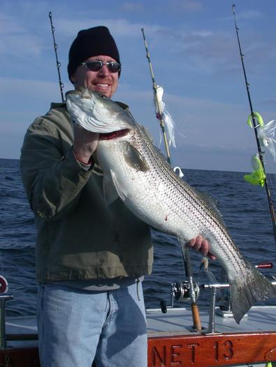 Arlie with the first ocean going lice infested striper of the season