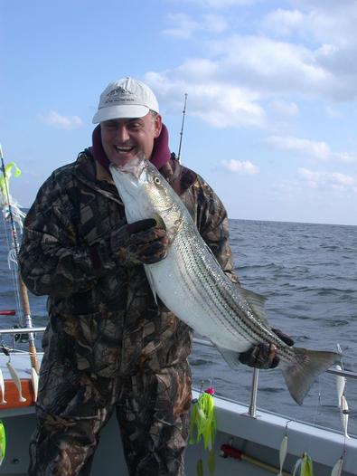 Having a good time Frank eyes up this striper! 