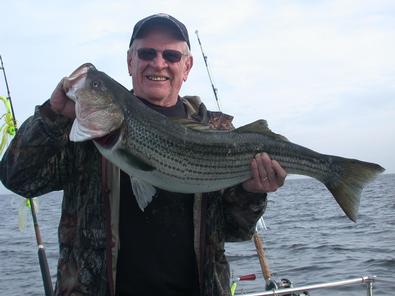 Jerry and his first trip to the Bay hooked and landed this nice striper!