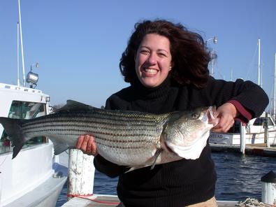 Energetic Rebecca was cheering all the way on her first Big striper!