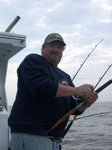 Basil had no trouble bringing in this striper!