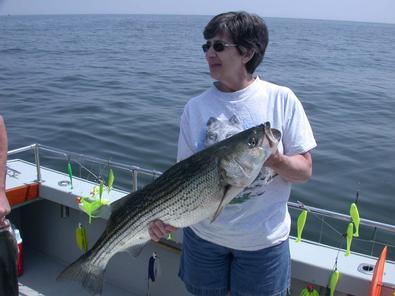 The "Bionic Woman" Darnell holds up this mighty fine catch