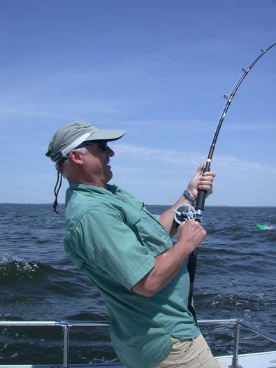Larry "the fisherman" hooks up with a trophy striper