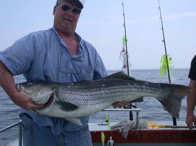 Steve Markle, Sr with his first Chesapeake Bay striper at 42 inches 28 pounds
