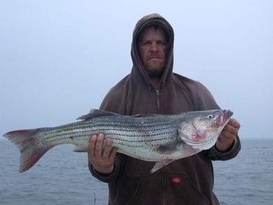Travis with this great eating sized striper
