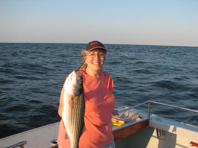 Kay Deardorff, the fishin' lady with this great striper