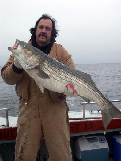 Tim holds on to the big fish of the day at 43 inches