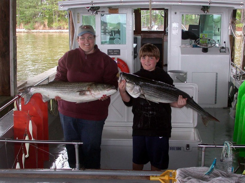 Happy Mothers Day Kim and Conor with their first Chesapeake Bay stripers and FIRST FISH!