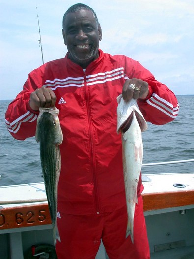 Larry Covington and two of his stripers