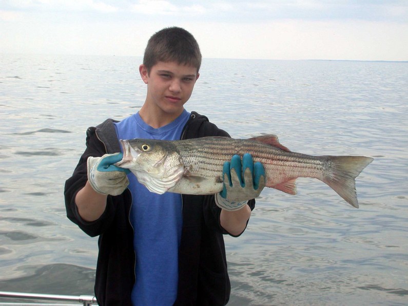 Grandson/nephew Charlie and the biggest fish of his life!